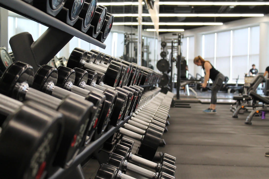 Indoor fitness space with weights and exercise equipment
